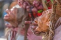 View of farmer dolls, manipulated with people inside, carrying large traditional basket, at the Medieval market of Canas Royalty Free Stock Photo