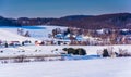 View of farms and snow-covered rolling hills in rural York Count