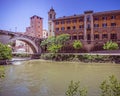 A view of fate bene fratelli hospital and Fabricio bridge on Tiber river. Royalty Free Stock Photo