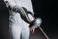 View of fencer in fencing suit