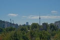 View on the Fernsehturm tower above the trees of Mauerpark, Berlin