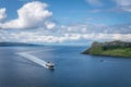 A view of a ferry coming inro uig port that has come from tarbert port