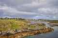 Small fishermen village on island in Helgeland archipelago in the Norwegian sea Royalty Free Stock Photo