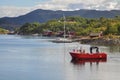 Small fishermen village with traditional red houses in Helgeland archipelago Royalty Free Stock Photo