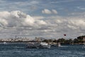 View of ferryboats passing in front of Topkapi Palace in Istanbul. Asian side is in the background.