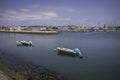 View of a few sailing boats along the shoreline in the river in Lagos, Algarve, Portugal Royalty Free Stock Photo