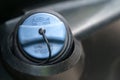 View of the filler cap of the AdBlue tank on a truck.