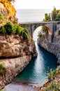 View on Fiordo di Furore arc bridge built between high rocky cliffs above the Tyrrhenian sea bay in Campania region. Unique cove Royalty Free Stock Photo