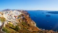 View of Fira village built on top of volcano cliff and blue sea Santorini island, Greece, Europe Royalty Free Stock Photo