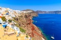 View of Fira village built on top of volcano cliff and blue sea Santorini island, Greece Royalty Free Stock Photo