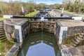 A view of the first lock at Hatton Locks, UK with the lock staircase in the distance Royalty Free Stock Photo