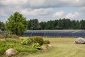 View of the first solar collector field for centralized heating in Latvia on a sunny day