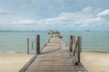 View at a fishing boat from the pier, at the island of Koh Samet Royalty Free Stock Photo