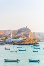 View of fishing boats anchoring in a bay in the Omani town Al Ayjah