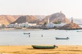 View of fishing boats anchoring in a bay in the Omani town Al Ayjah