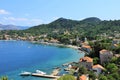 View of the fishing port and the beach, with cafes, boats, in the village Lopud, Lopud Island, one of the Elaphiti Islands, view f Royalty Free Stock Photo