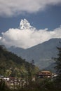 View of Fishtail Peak in Himalaya, Nepal covered by clouds