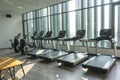 View of fitness room with many exercise equipment