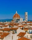 Florence Cathedral and Giotto`s Bell Tower under blue sky, over houses of the historical center of Florence, Italy Royalty Free Stock Photo