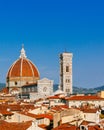 Florence Cathedral and Giotto`s Bell Tower under blue sky, over houses of the historical center of Florence, Italy Royalty Free Stock Photo