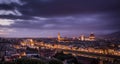 View of Florence during sunset showing the River Arno, Ponte Vecchio, the Palazzo Vecchio and the Duomo - Florence, Tuscany, Italy