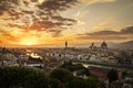 View of Florence during sunset showing the River Arno, Ponte Vecchio, the Palazzo Vecchio and the Duomo - Florence, Tuscany, Italy