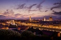 View of Florence during sunset showing the River Arno, Ponte Vecchio, the Palazzo Vecchio and the Duomo - Florence, Tuscany, Italy
