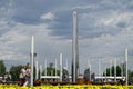 A view of a flower bed, modern street lamps and an architectural stele of the city of labor valor in Magnitogorsk. July, 16, 2021 Royalty Free Stock Photo