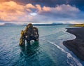 View from flying drone. Beautifulsunset with huge basalt stack - Hvitserkur on background. Splendid summer scene of eastern shore