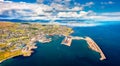 View from flying drone. Breathtaking summer sityscape of Torshavn town. Aerial morning scene of Streymoy island, Faroe, Kingdom of