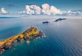 View from flying drone. Captivating spring scene of popular tourist destination Torra di a Parata - 16th-century Genoese tower rea