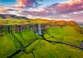 View from flying drone. Captivating summer view of Seljalandsfoss waterfall. Colorful sunrise in Iceland, Europe.