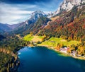 View from flying drone. Exciting autumn scene of Hintersee lake, Germany, Europe. Aerial morning view of Bavarian Alps. Beauty of Royalty Free Stock Photo