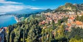 View from flying drone. Exciting morning view of Taormina town and Etna volcano on background. Splendid spring seascape of Mediter