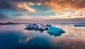 View from flying drone of floating of blue icebergs in Jokulsarlon Glacier Lagoon. Dramatic summer sunrise in Vatnajokull National Royalty Free Stock Photo