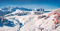 View from flying drone of Italian ski resort. Bright morning view of Dolomite Alps. Royalty Free Stock Photo