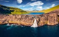 View from flying drone. Spectacular afternoon view of Bosdalafossur waterfall. Dramatic summer scene of Sorvagsvatn lake, Vagar, F