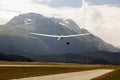 A view of a flying glider in the airport of St Moritz in the alps switzerland Royalty Free Stock Photo