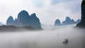 view of fog with boats on river near Xingping town Royalty Free Stock Photo