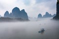view of fog with ships on river near Xingping town Royalty Free Stock Photo