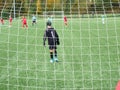 View through football gate net during a football mach