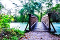 Wooden bridge to an island on a lake