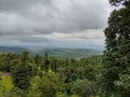 view of forest and black clouds in monsoon