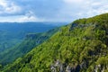 View of forest covere mountain slopes above Kolpa valley in Slovenia