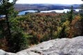 View of forest displaying fall foliage and First and Second Lakes from the top of Bald Mountain in NY Royalty Free Stock Photo