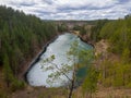 View of the forest lake with melting ice from the top of the mountain. Spring forest landscape. Royalty Free Stock Photo