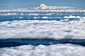 Mount Rainier in clouds and Seattle. Royalty Free Stock Photo