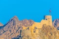 View of a fort in Muttrah district of Muscat during sunset, Oman Royalty Free Stock Photo