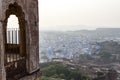 View at the fortifications of Mehrangarh fort and the blue city Jodhpur, Rajasthan, India