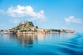 View of the fortress of Corfu from the sea in the morning mist with a trace of waves from the ferry. popular tourist attractions. Royalty Free Stock Photo